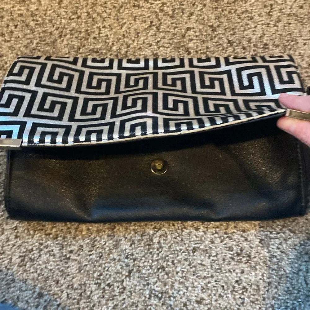 Fornasetti-inspired geometric print handbag